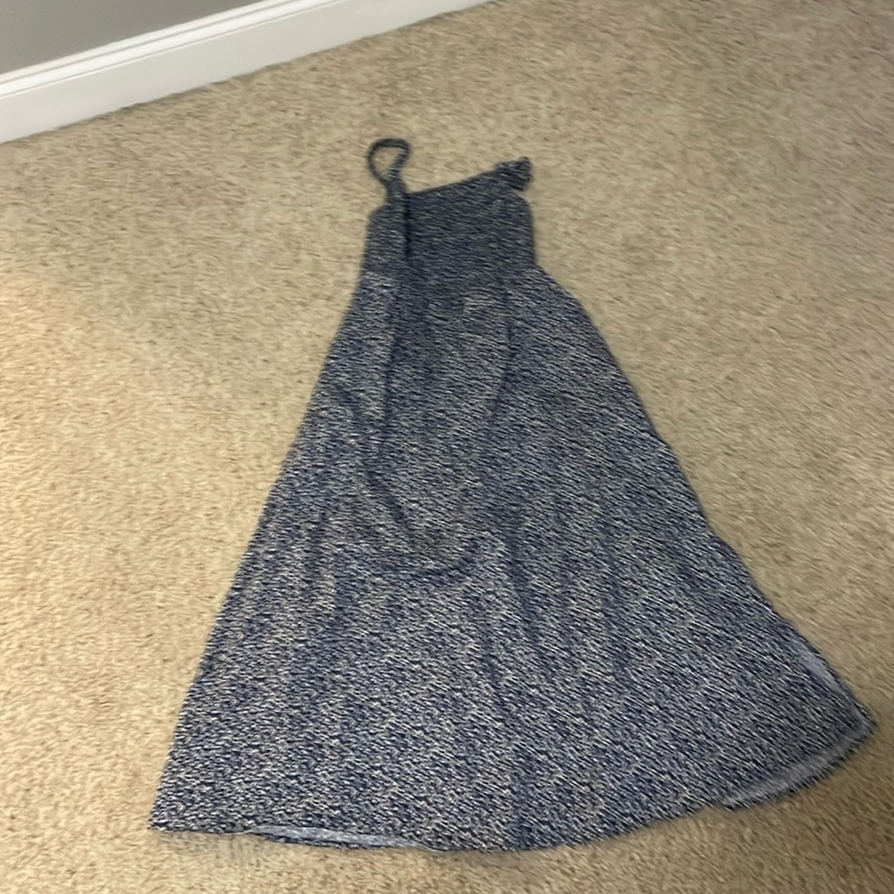 Long blue dress with floral design.  Open back- spaghetti straps